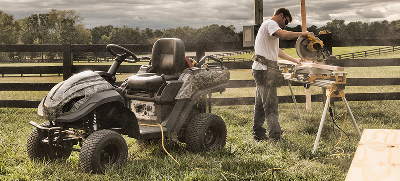 Illustration for article titled A Riding Mower That Transforms Into an ATV Is All Work and All Play